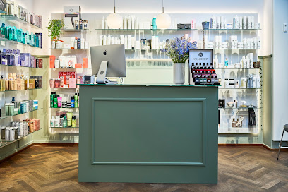 Østergaard Intercoiffure – Skab din perfekte frisure!
